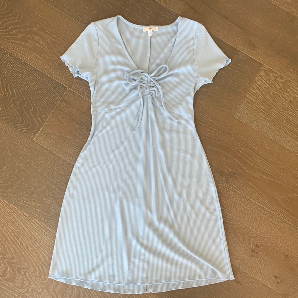 Baby blue dress with gentle wear. Lots of compliments; just ready to rotate out